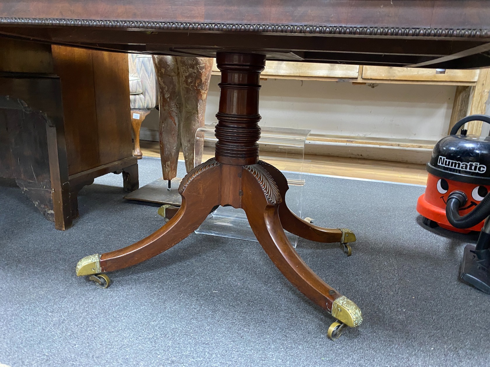 A Regency rectangular mahogany tilt top dining table, length 136cm, width 94cm, height 71cm